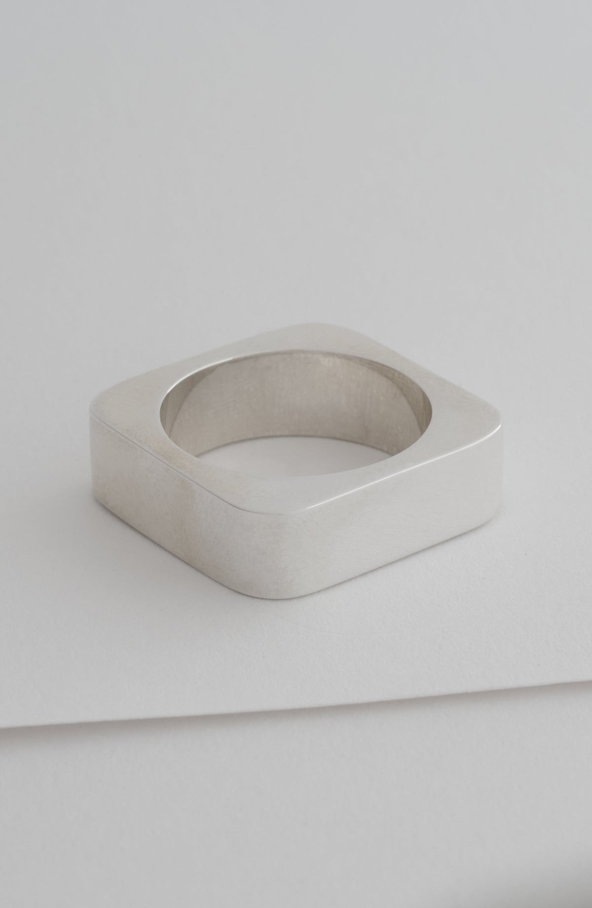 Square Ring showing its square exterior and circular interior